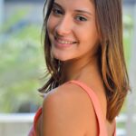 Adorable skinny teen Roxanna flashes her trimmed vagina in public