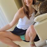 Amateur Lily upskirting in public & posing with her pets before getting naked