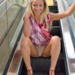 Appealing cutie Staci flashes her hot ass and lacy undies in public