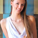 Attractive teen Kourtney gets rid of her dress in public and poses butt naked