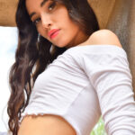 Beautiful amateur Arya gets naked before masturbating with a glass dildo