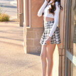 Charming brunette teen Camilla flashes in public before masturbating in a car