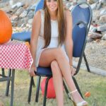 Glamour babe in a see-through dress Aveline flashing an upskirt in public