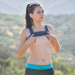 Hot babe with small tits Larysa stretches her twat after a morning run