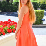 Natural redhead Sierra gets totally naked on a winding staircase