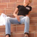 Naughty teen Kata exposes her tiny tits & her shaved pink pussy in public
