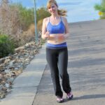 Skinny blonde Emilee exposes her tits while jogging and gets naked at home