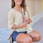 Slim teen in heels Melina doffs her denim skirt and poses naked in public