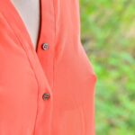 Solo girl slips off her long and quite see thru shirt out on the balcony