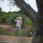 Tiny blonde teen Chloe works out in a hoodie & shows her small tits in public