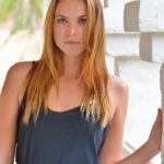 Clothed girl next door flashes her bare ass before playing with her pussy