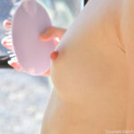 Ginger teen Myra drops her clothes and flaunts her amazing ass before toying