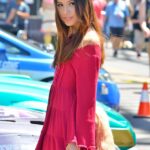 Glamour babe in a beautiful dress Melody teasing with sexy upskirt in public