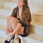 Tall cutie Jeri hikes her dress and toys her cunt with a thick rubber toy