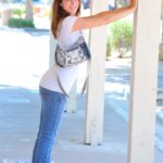 Flawless beauty Thena undresses to show off her small compact ass