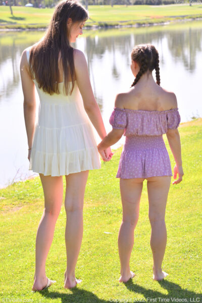 Horny tall babe Mira & her petite friend Olivia strip & pose naked outdoors Image #2