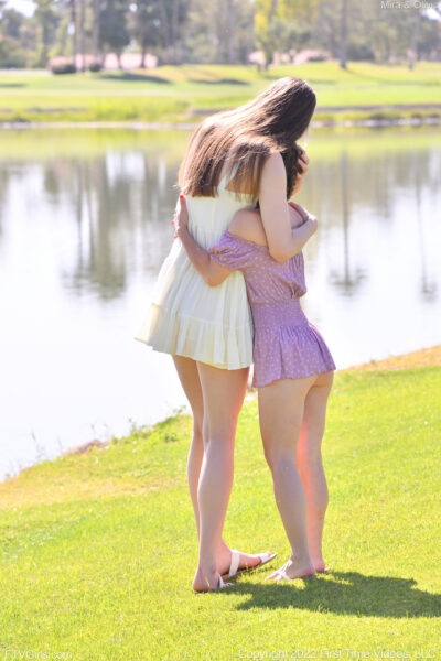 Horny tall babe Mira & her petite friend Olivia strip & pose naked outdoors Image #3