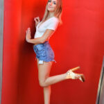 Petite honey Sierra moves her denim shorts aside and shows her twat outdoors
