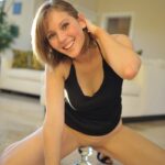 White chick with nice tits flashes outside before fisting her twat indoors