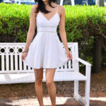 Amateur beauty Reina strips naked in public and spreads her beaver