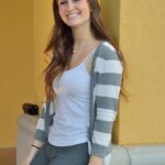 Breathtaking brunette Summer bares her natural juggs and trimmed pussy