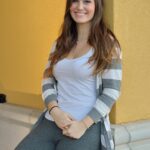 Breathtaking brunette Summer bares her natural juggs and trimmed pussy