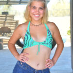 Cute blonde Lilith gets totally naked before masturbating indoors and outdoors