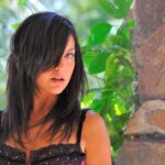 Glamorous amateur Annalisa flashes her shaved pussy in sexy outfits in public