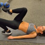 Hot babe Charlotte reveals her big juggs and petite figure while exercising
