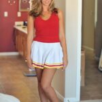 Lovely cheerleader Pamela fingers & toys her sweet shaved pussy