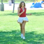 Lovely cheerleader Pamela fingers & toys her sweet shaved pussy