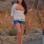 Cute teen Aveline reveals her asshole and pierced nipples in public transport