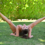 Big boobed amateur babe Scarlett strips naked in public while doing exercises