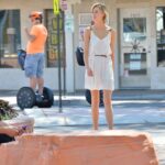 Charming babe Amy revealing and toying her pink clitoris in public