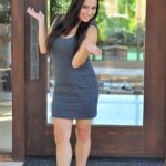 Cute amateur brunette Rikki spreads her legs & fucks herself with a heel