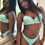 Cute ebony babe Tessa stripping and masturbating in front of the mirror