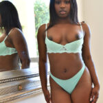 Cute ebony babe Tessa stripping and masturbating in front of the mirror