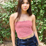 Flexible brunette teen Brianna shows her tits and twat in creative ways