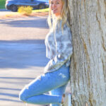 Golden-haired babe Amber gets naked in public and shows her perfect body