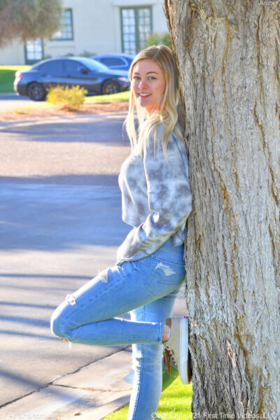 Golden-haired babe Amber gets naked in public and shows her perfect body Image #9