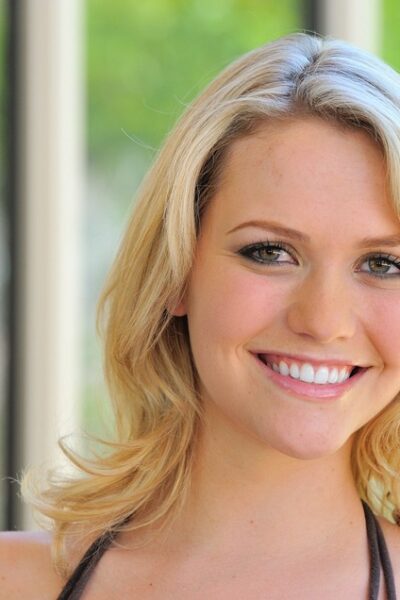 Teen beauty with blonde hair changes into a short dress for public flashing Image #11