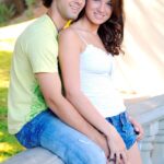 Beautiful amateur Gabby hikes her denim skirt up and poses with her boyfriend