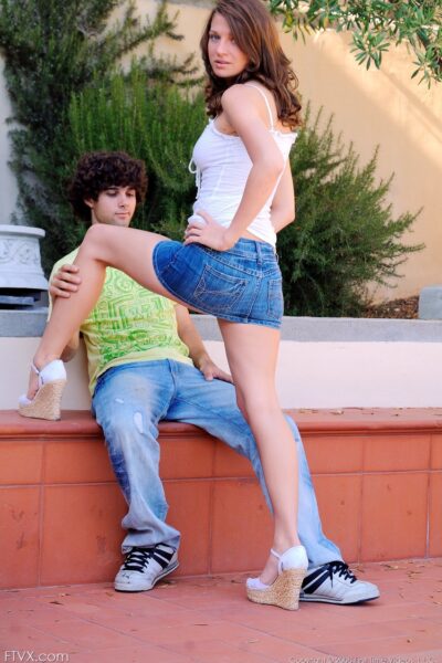 Beautiful amateur Gabby hikes her denim skirt up and poses with her boyfriend Image #4