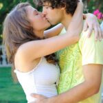 Beautiful amateur Gabby hikes her denim skirt up and poses with her boyfriend