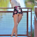 Cute amateur Winter hikes her skirt and flashes her vagina in public