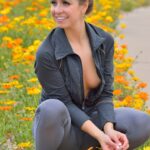 Cute jogger Reese undresses and shows her tiny tits and flexibility outdoors