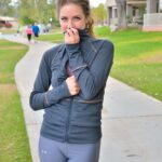 Cute jogger Reese undresses and shows her tiny tits and flexibility outdoors