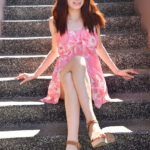 Pale redhead Eva gets naked before dildoing her tight slit