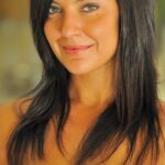 Raven-haired babe Annalisa peels her bikini off and rubs her clit by the pool