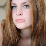 Sexy babe Danielle plays with her big tits & spreads yummy twat & on her bed